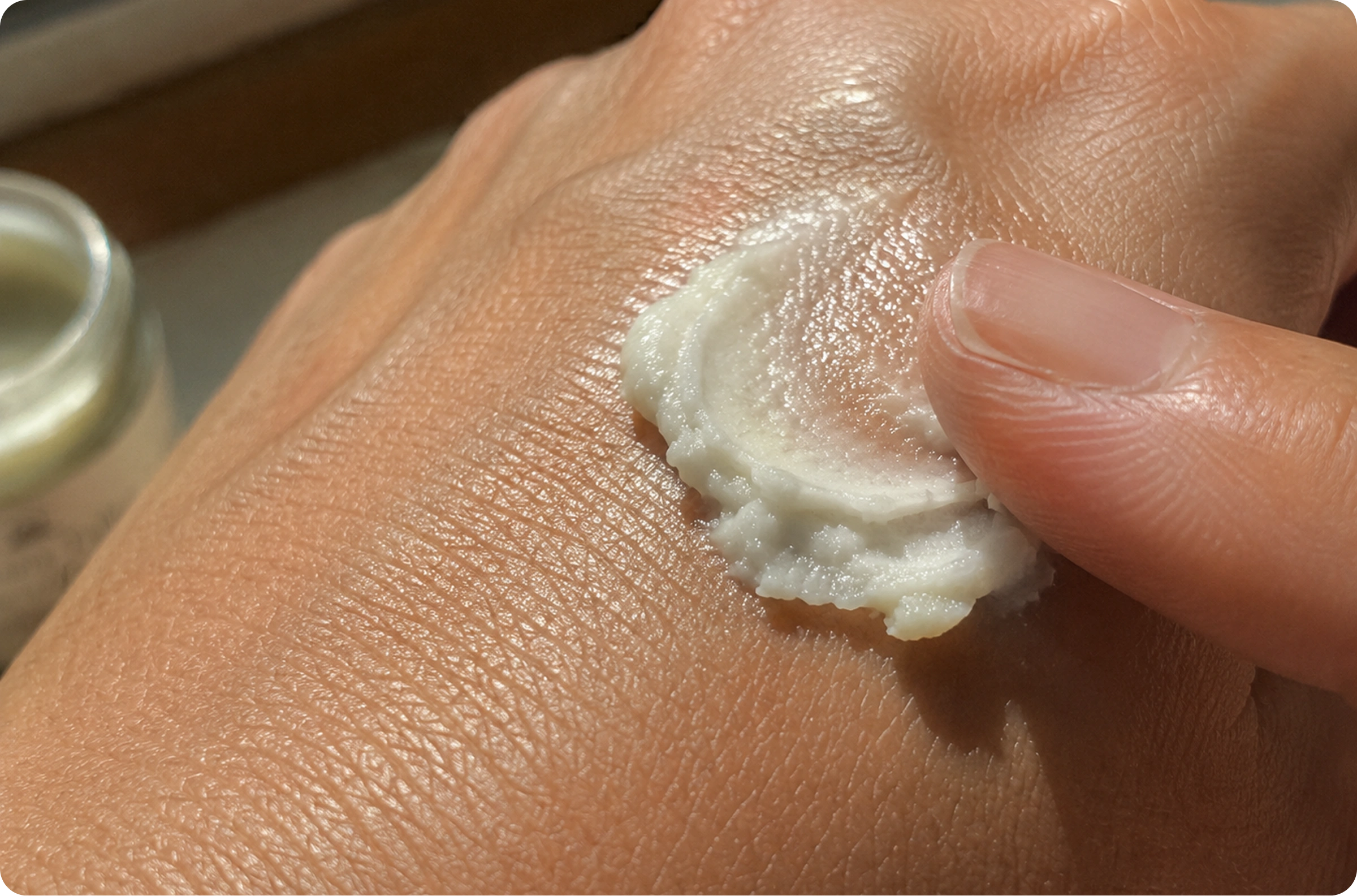 Applying Montana Tallow Face Balm to the back of the hand